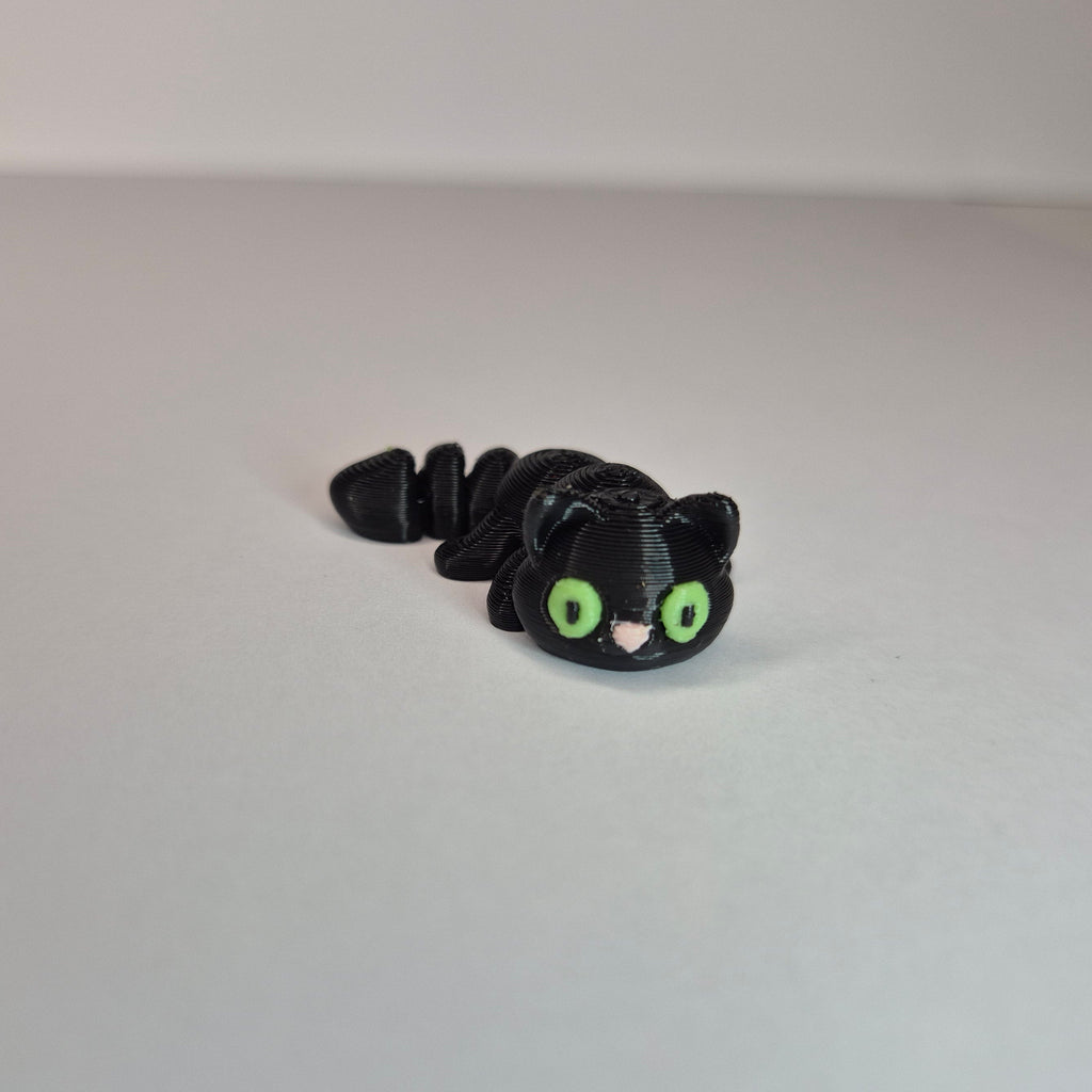 Mini Cat Laying Black